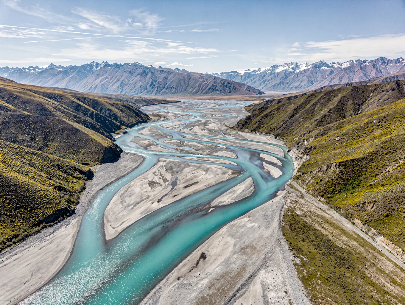 Aerial view of turquoise braided river channels